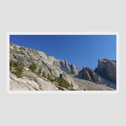 Majestic Mountain Peaks Under Blue Sky Sticker