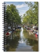 Serene Amsterdam Canal With Boats And Trees Spiral Notebook