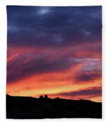 Vivid Twilight over Rocky Silhouette Fleece Blanket