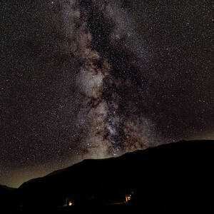 Starry Night Over Mountain Landscape by Brandon Wichmann