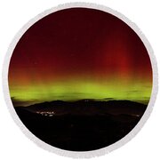 Northern Lights Over Mountain Range Round Beach Towel