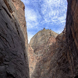 Towering Canyon Cliffs and Blue Sky by Brandon Wichmann