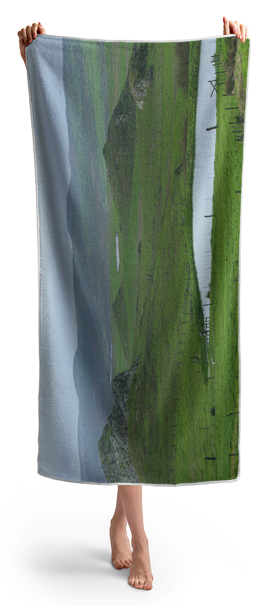 Tranquil Green Hills And Distant Sea Beach Towel