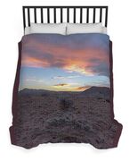 Desert Sunset Over Rugged Terrain Duvet Cover