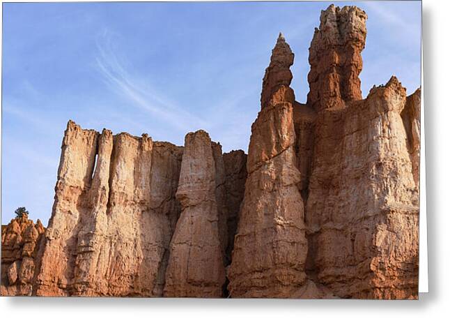 Majestic Rock Formations Under Blue Sky In Bryce Canyon National Park Greeting Card