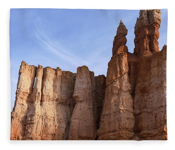 Majestic Rock Formations Under Blue Sky In Bryce Canyon National Park Fleece Blanket