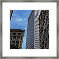 Skyscrapers Against Blue Sky Framed Print