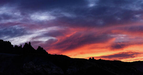 Vivid Twilight over Rocky Silhouette Poster