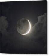 Shimmering Crescent Among Clouds Canvas Print