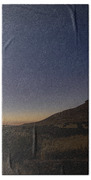 Twilight Comet Over Desert Landscape Beach Towel