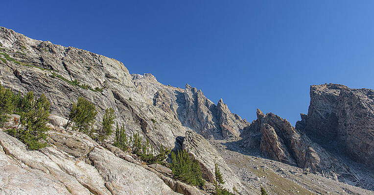Wall Art featuring the photograph Majestic Mountain Peaks Under Blue Sky by Brandon Wichmann