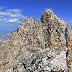 Majestic Mountain Peak Under Clear Skies by Brandon Wichmann