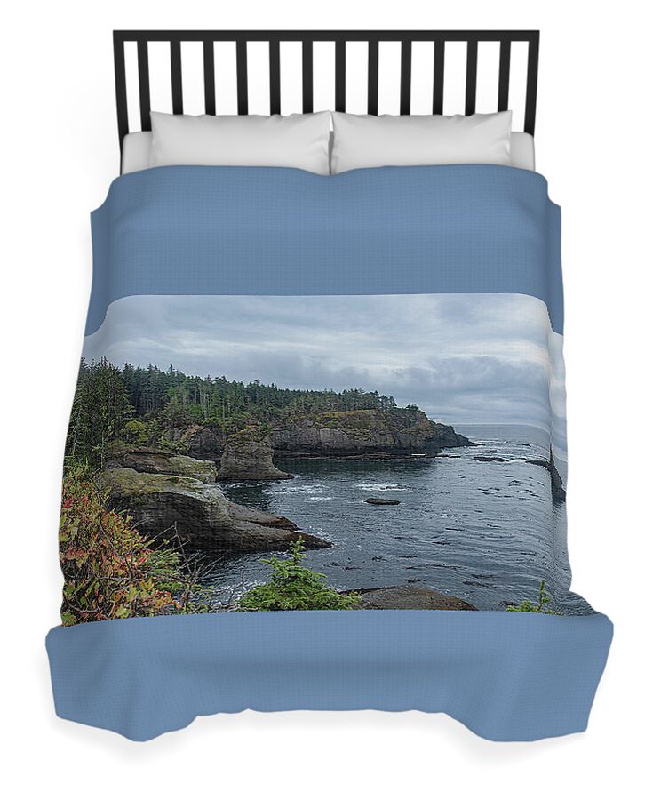 Serene Coastal Cliffs at Dawn Duvet Cover