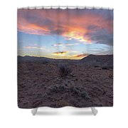 Desert Sunset Over Rugged Terrain Shower Curtain