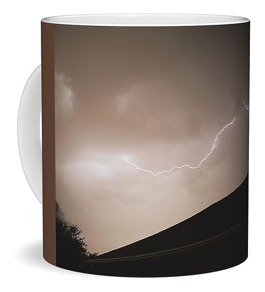 Lightning Illuminates Night Sky Coffee Mug