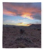 Desert Sunset Over Rugged Terrain Fleece Blanket