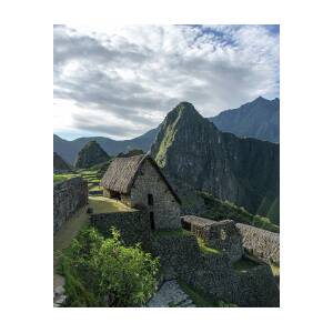 Ancient Ruins with Majestic Mountain Backdrop by Brandon Wichmann