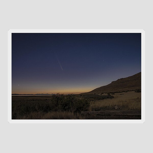 Twilight Comet Over Desert Landscape Sticker