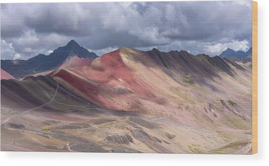 Rainbow Mountain Range Under Cloudy Skies Wood Print