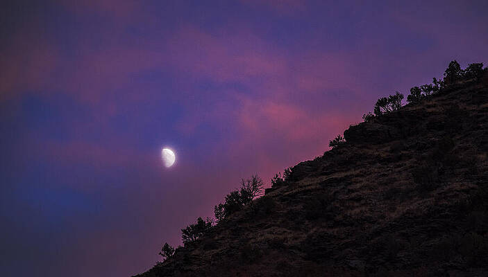 Sky Wall Art featuring the photograph Moonlit Evening Over Silhouetted Hills by Brandon Wichmann