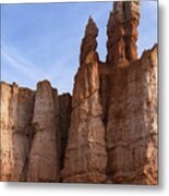 Majestic Rock Formations Under Blue Sky In Bryce Canyon National Park Metal Print