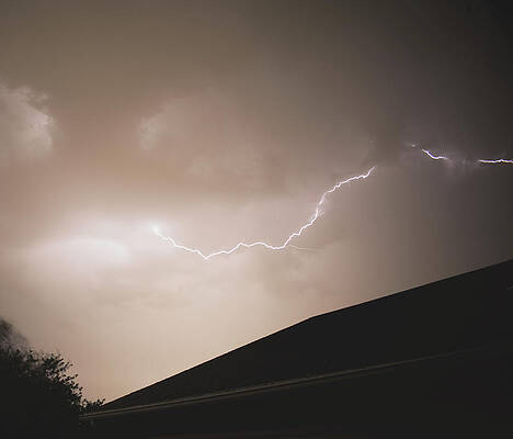 Sky Wall Art featuring the photograph Lightning Illuminates Night Sky by Brandon Wichmann