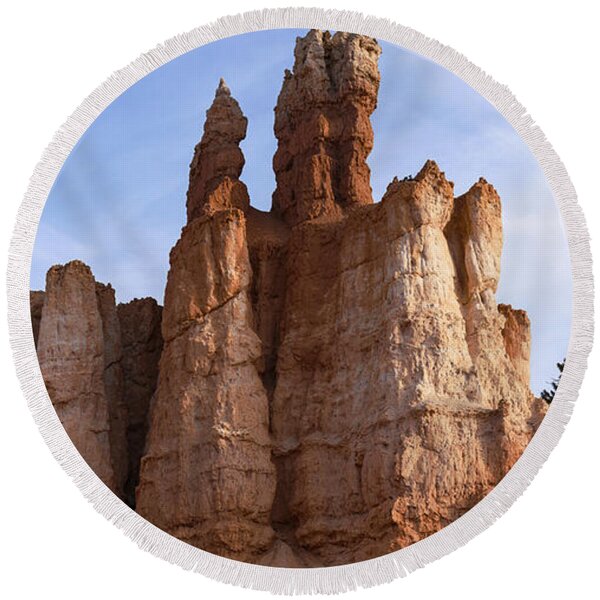 Majestic Rock Formations Under Blue Sky In Bryce Canyon National Park Round Beach Towel