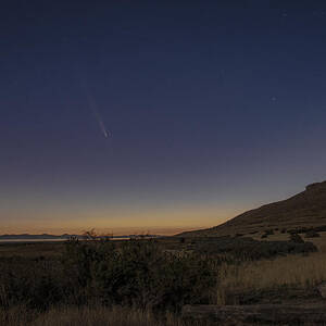 Twilight Comet Over Desert Landscape by Brandon Wichmann