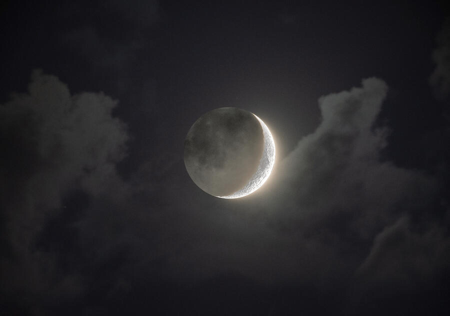 Shimmering Crescent Among Clouds Photograph by Brandon Wichmann