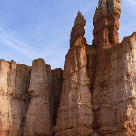 Majestic Rock Formations Under Blue Sky in Bryce Canyon National Park