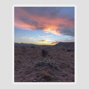 Desert Sunset Over Rugged Terrain Sticker