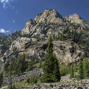 Majestic Mountain Peaks Under Blue Sky in Cascade Canyon by Brandon Wichmann Majestic Mountain Peaks Under Blue Sky in Cascade Canyon by Brandon Wichmann
