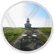 Lighthouse Under A Bright Sky Round Beach Towel