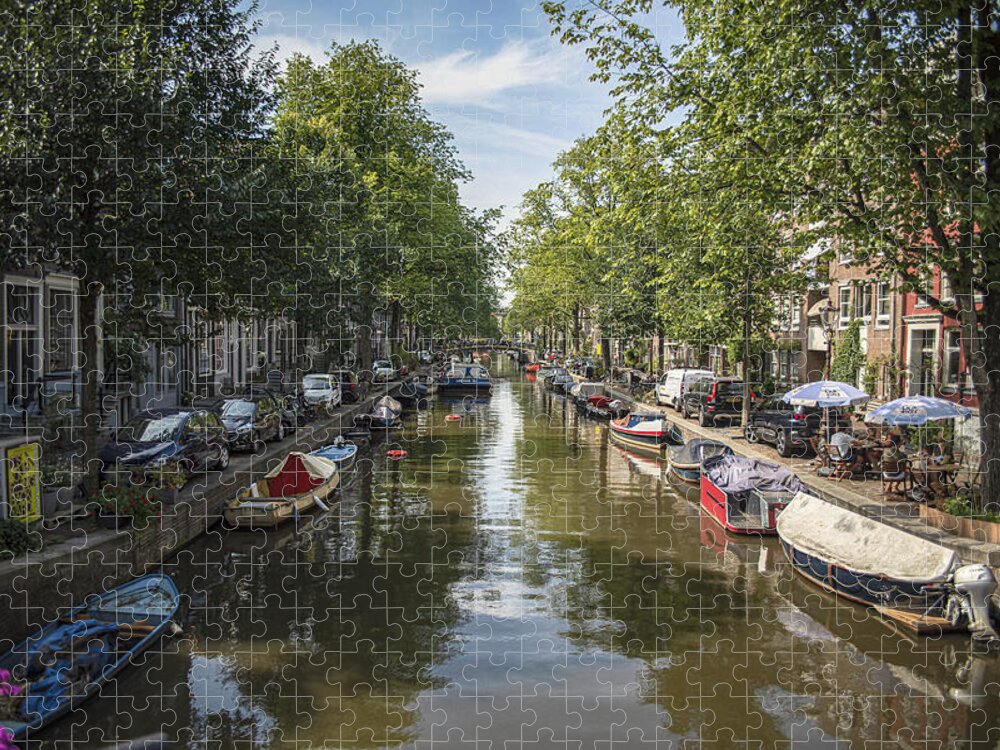 Serene Amsterdam Canal With Boats And Trees Jigsaw Puzzle