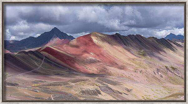 Rainbow Mountain Range Under Cloudy Skies Framed Print