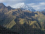 Majestic Andes Mountain Peaks Under Cloudy Sky Jigsaw Puzzle