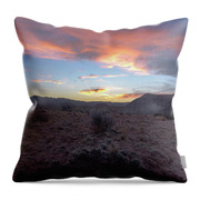 Desert Sunset Over Rugged Terrain Throw Pillow