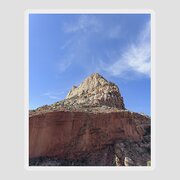 Majestic Mountain Peak Under Blue Sky Sticker