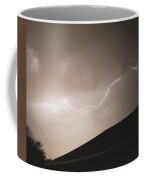 Lightning Illuminates Night Sky Coffee Mug