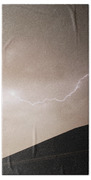 Lightning Illuminates Night Sky Beach Towel