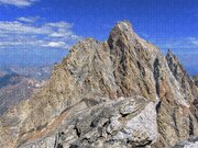 Majestic Mountain Peak Under Clear Skies Jigsaw Puzzle