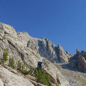Majestic Mountain Peaks Under Blue Sky by Brandon Wichmann Majestic Mountain Peaks Under Blue Sky by Brandon Wichmann