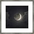 Shimmering Crescent Among Clouds Framed Print