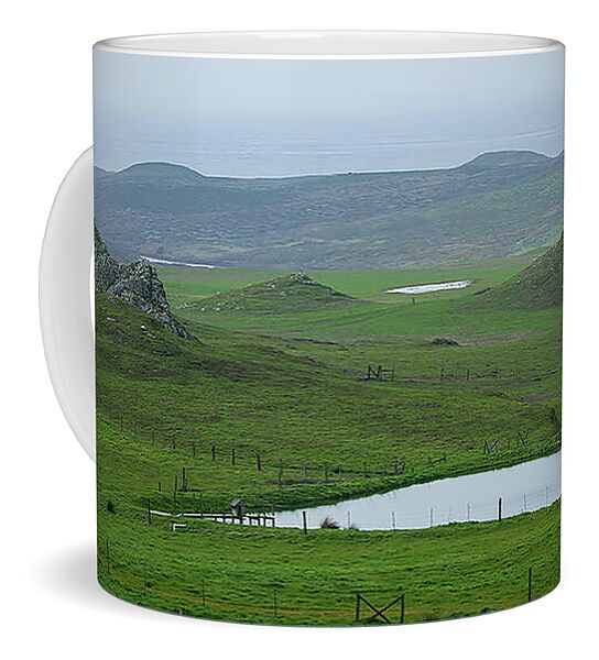 Tranquil Green Hills And Distant Sea Coffee Mug