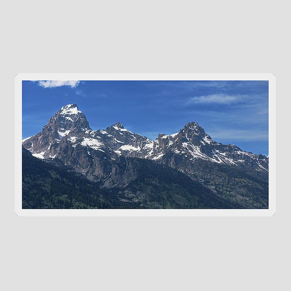 Snow-capped Teton Mountain Peaks Under Blue Sky Sticker