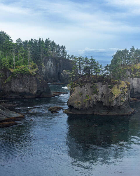 Serene Coastal Rocky Landscape Poster