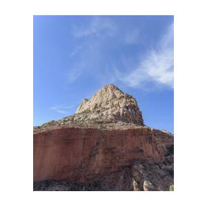 Majestic Mountain Peak Under Blue Sky by Brandon Wichmann