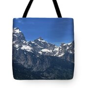 Snow-capped Teton Mountain Peaks Under Blue Sky Tote Bag