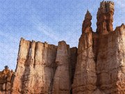Majestic Rock Formations Under Blue Sky In Bryce Canyon National Park Jigsaw Puzzle